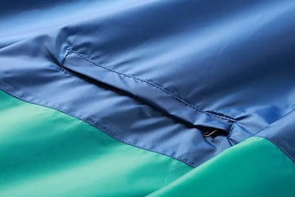 kleine Tasche, Pocket, Reißverschluss, Regenponcho Blau türkis seitentasche