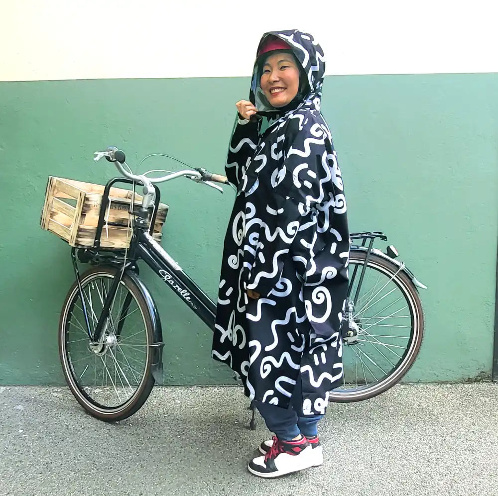 Fahrrad Regenponcho Damen mit Ärmeln schwarz weiß