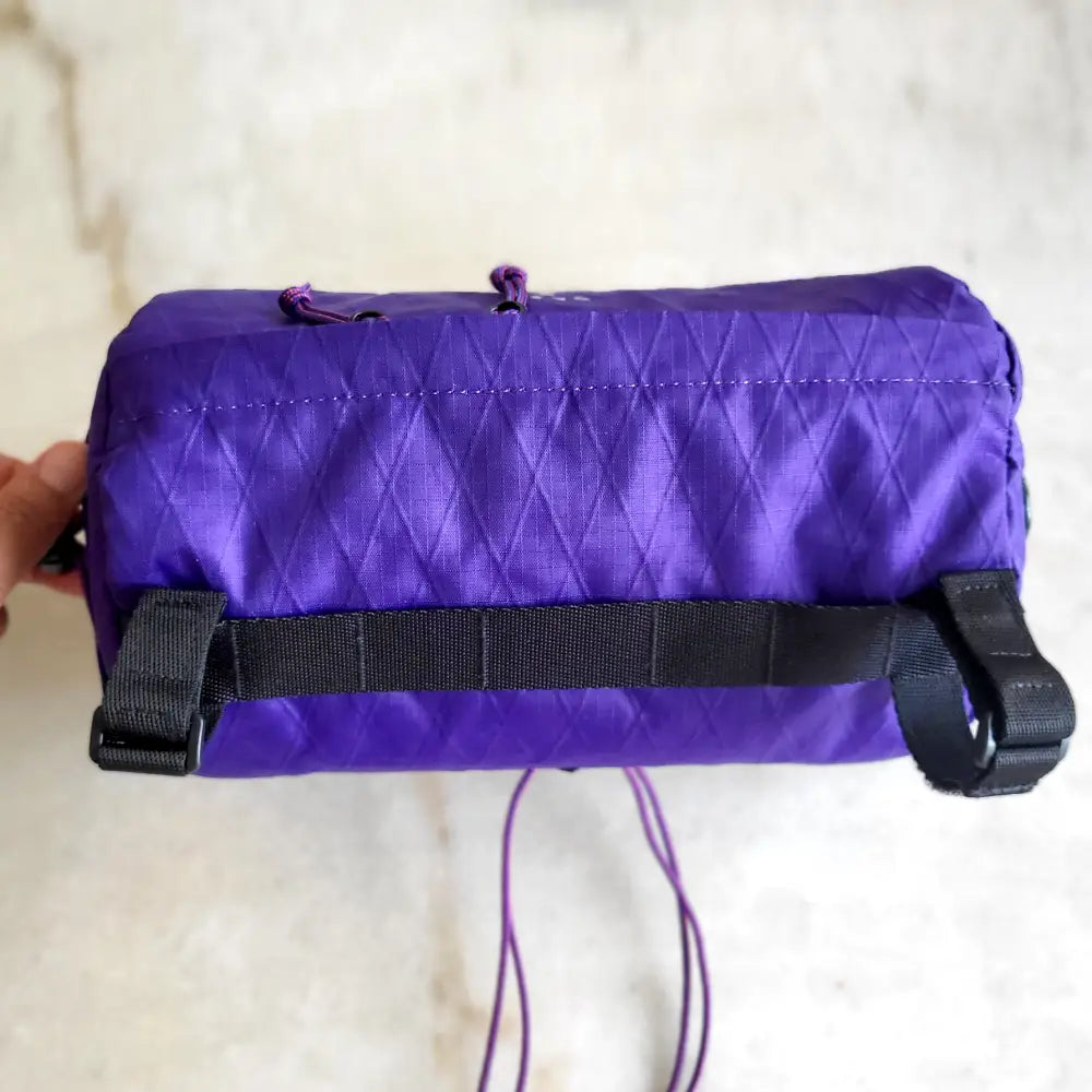 Klett Einhängung Lenker fürs Fahrrad Tasche lila vorne