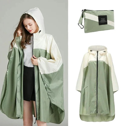 hellgrüner Regenponcho Damen mit Reißverschluss vorne offen, kleine Tasche zur Aufbewahrung, ideal fürs Fahrradfahren oder Wandern. 100% wasserdichte Wasserlsäule hoch