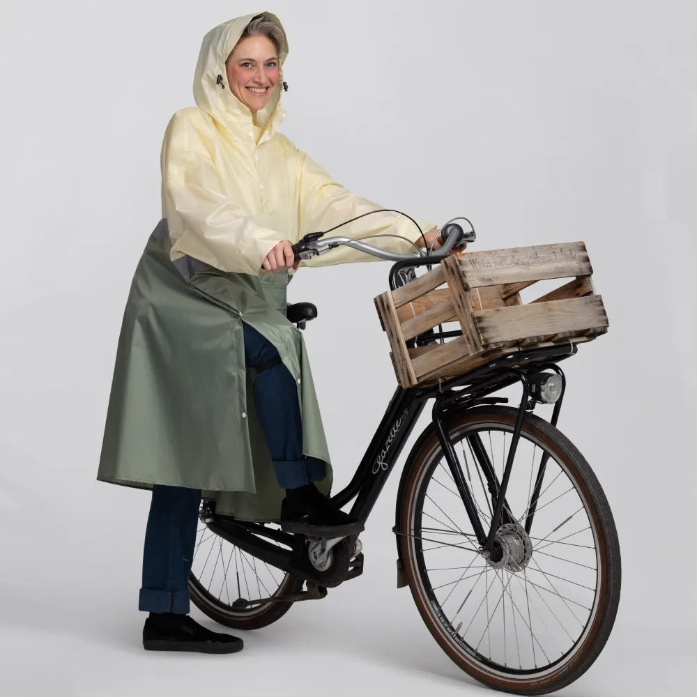 fahrrad regenponcho damen wasserdicht atmungsaktiv extra lang mit Ärmeln und großer Kapuze
